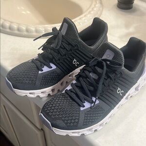 On Running Black and White Sneakers